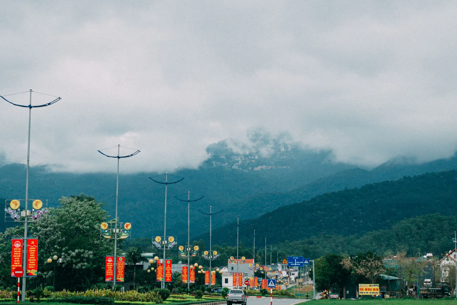 A road at the foot of mountains in Vietnam