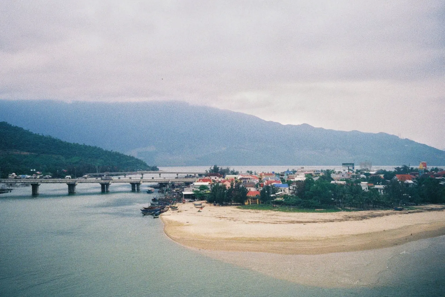 A coastal road and mountain range towards Lang Co on the way from Da Nang to Hue