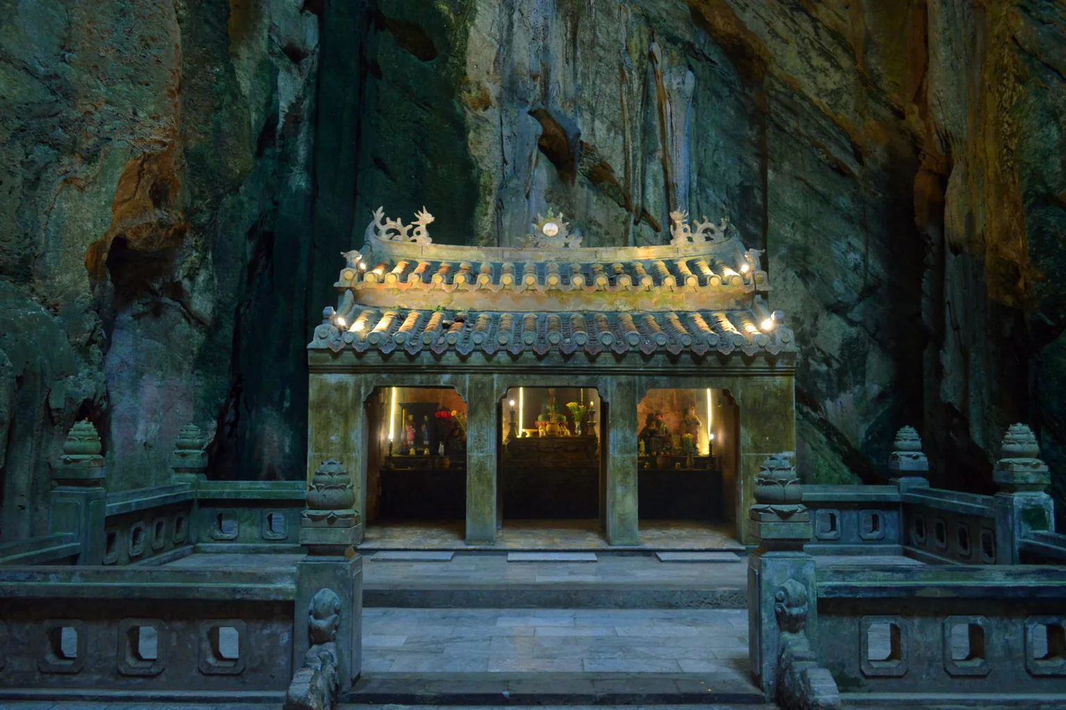 An ancient temple set inside a limestone mountain cave on the Marble Mountains