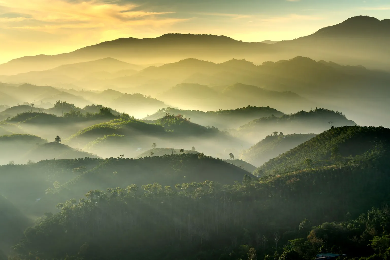 Winding mountain pass road in mist in Central Vietnam