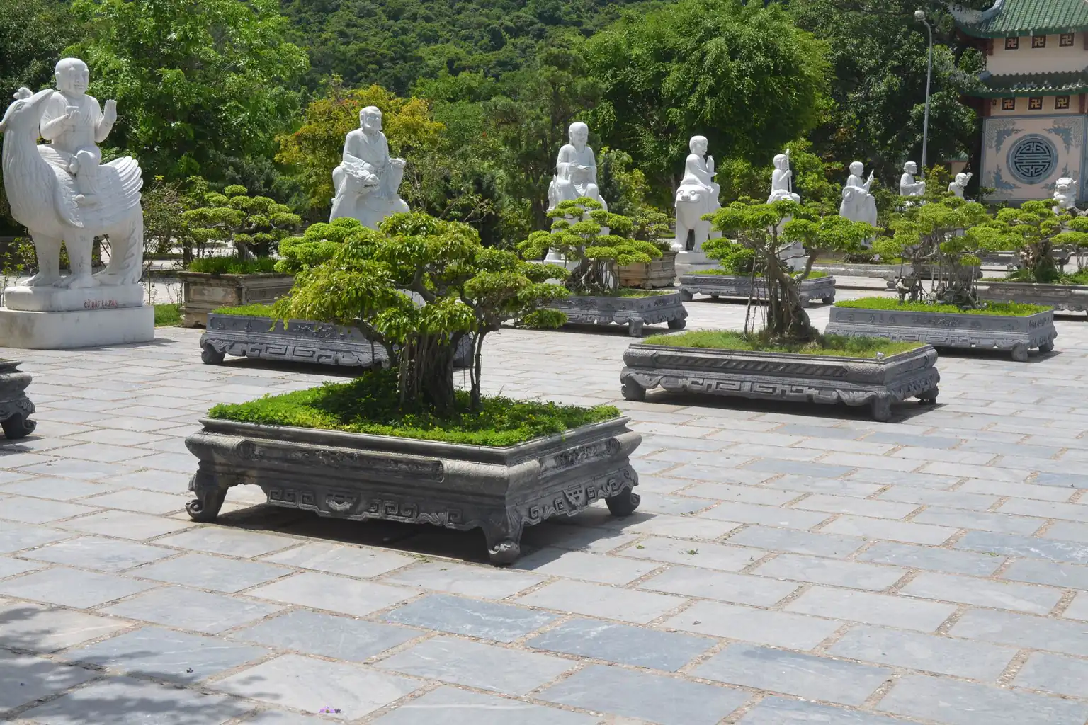 A temple garden and stone statues in Da Nang